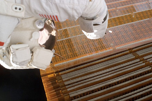 Curbeam does some work on the P6 solar array. Image credit Collect Space